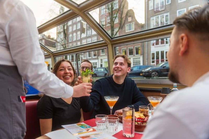 Amsterdam: Evening Cocktail Cruise along the canals - UNESCO Canal District views, stop by stop