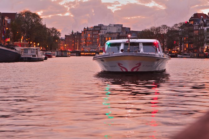 Amsterdam Evening Cocktail Cruise with snacks - Meeting at Damrak 16, Then Getting Seated for Better Views