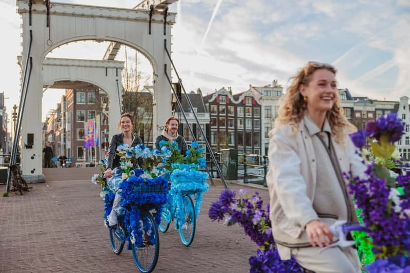 Amsterdam: Explore Canals, Guided Tour on Flower Bikes - Meeting at Nieuwezijds Voorburgwal 101, near Central Station