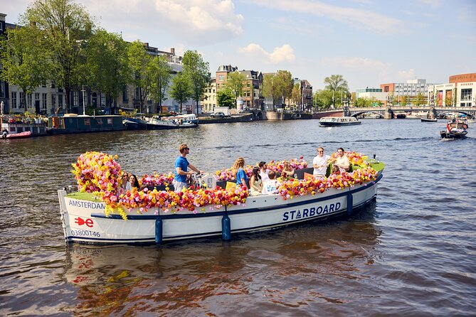 Amsterdam Flower Boat Canal Cruise with Local Guide - The Seven Bridges moment: best-known views without the walking