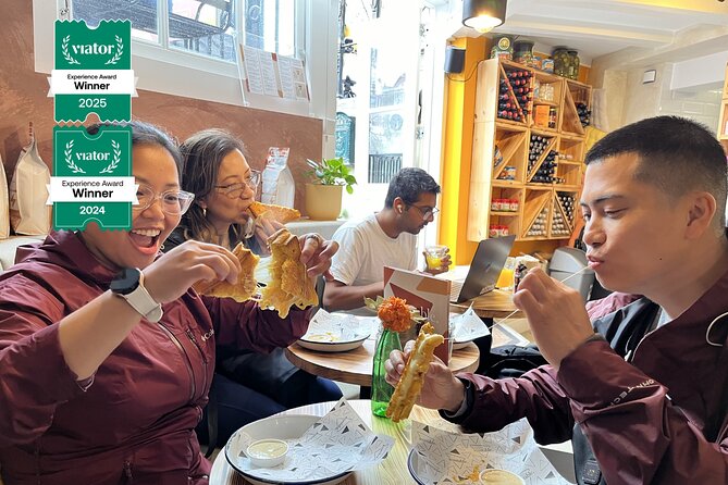 Amsterdam Food and Cultural Tour with Tastings - Torensluis and the Crooked-House Stories: Why the Bridges Look the Way They Do
