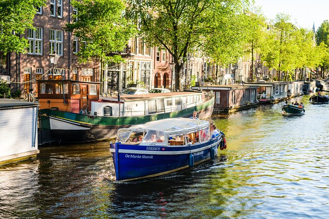 Amsterdam: German-speaking boat trip with bar on board - Quick highlights from this German-speaking Amsterdam boat trip