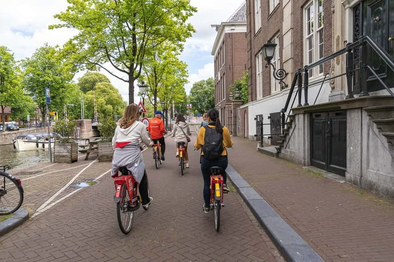 Amsterdam: Guided Bike Tour City Centre in EN/DE/FR/ES - Key highlights worth knowing before you go