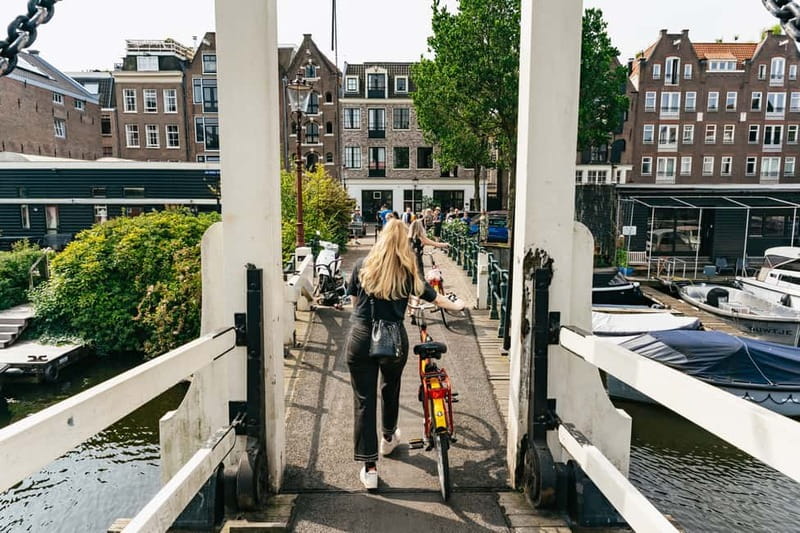 Amsterdam: Guided Bike Tour City Centre in EN/DE/FR/ES - Jordaan and the Nine Straatjes: boutiques, cafes, and canal-side character