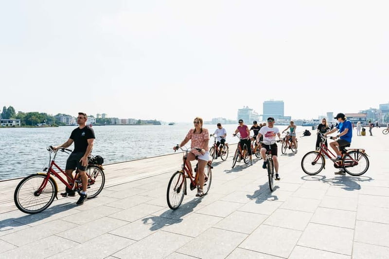 Amsterdam: Guided Bike Tour City Centre in EN/DE/FR/ES - Westerkerk and the Anne Frank House area: big landmarks with context