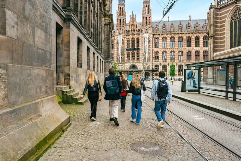 Amsterdam: Guided Cultural Walking Tour - The Amstel River back to the National Monument, closing the loop with meaning