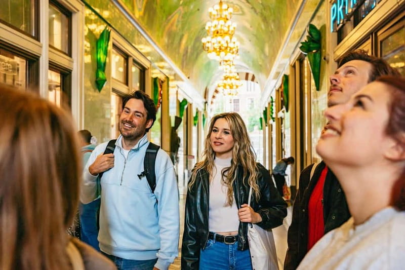 Amsterdam: Guided Cultural Walking Tour - Beurs van Berlage to Magna Plaza, from trade to modern shopping culture
