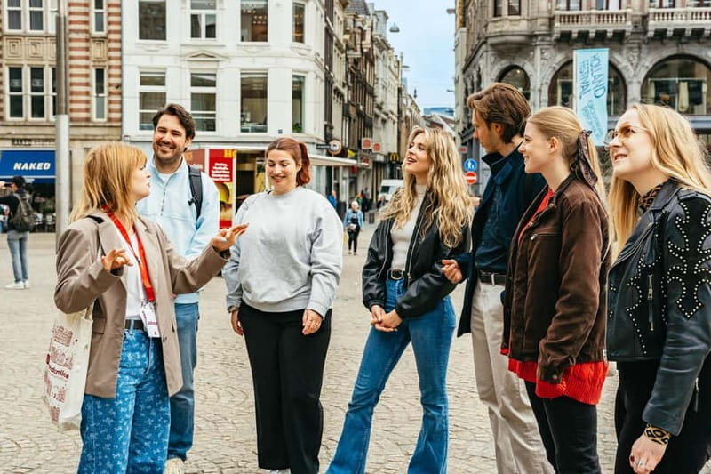 Amsterdam: Guided Cultural Walking Tour - Multatuli Statue and the tiny-house moment, small symbols with big meaning