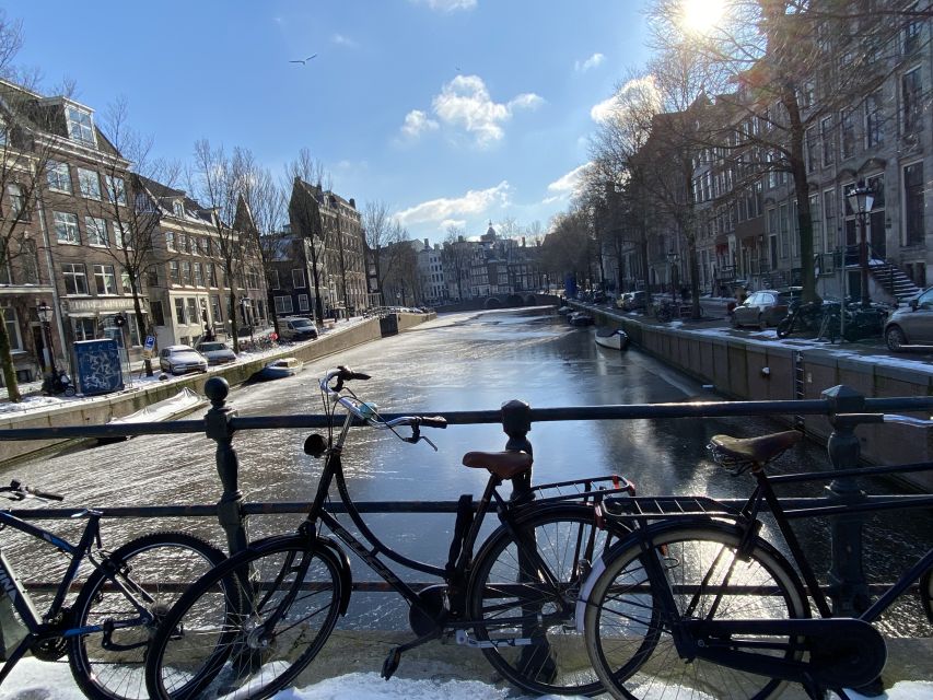 Amsterdam: Guided Off-The-Beaten-Track Walking Tour - Dam Square in a tight loop: Palace, National Monument, and Nieuwe Kerk