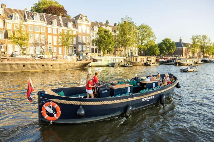Amsterdam: Guided Open Boat Canal Cruise Including Drink - Electric Open Boats: Why This Feels So Right in Amsterdam