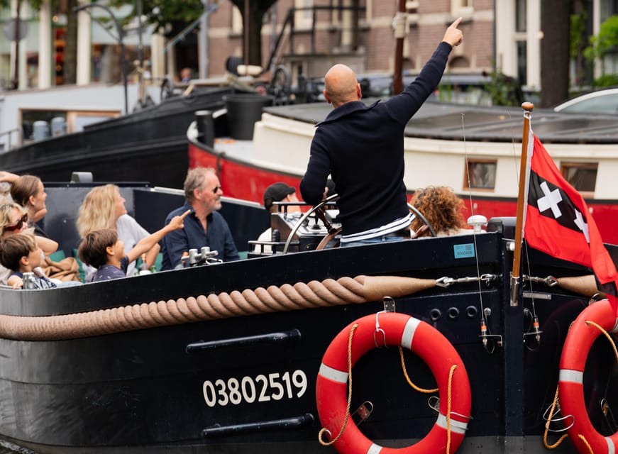 Amsterdam: Guided Open Boat Canal Cruise Including Drink - What the Live Commentary Adds (and Who Keeps It Fun)