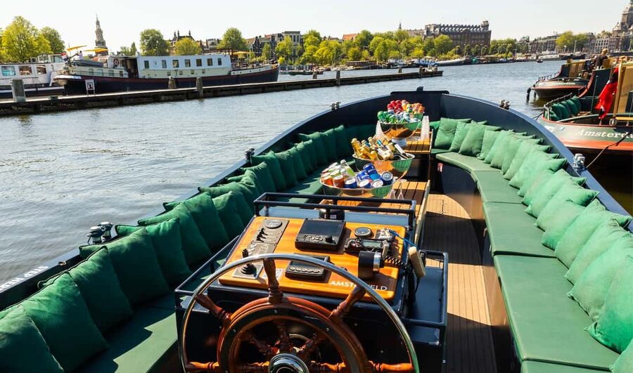 Amsterdam: Guided Open Boat Canal Cruise Including Drink - Comfort and Photo Strategy for a One-Hour Canal Cruise