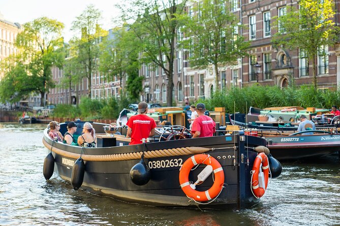 Amsterdam: Guided Open Boat Canal Cruise Unlimited Drinks Option - Price and value: why $23.59 can make sense, and when it might not