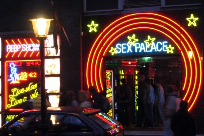 Amsterdam: Guided Red Light District and City Walking Tour - Condomerie Since 1987: A Modern Detour With a Straight Story