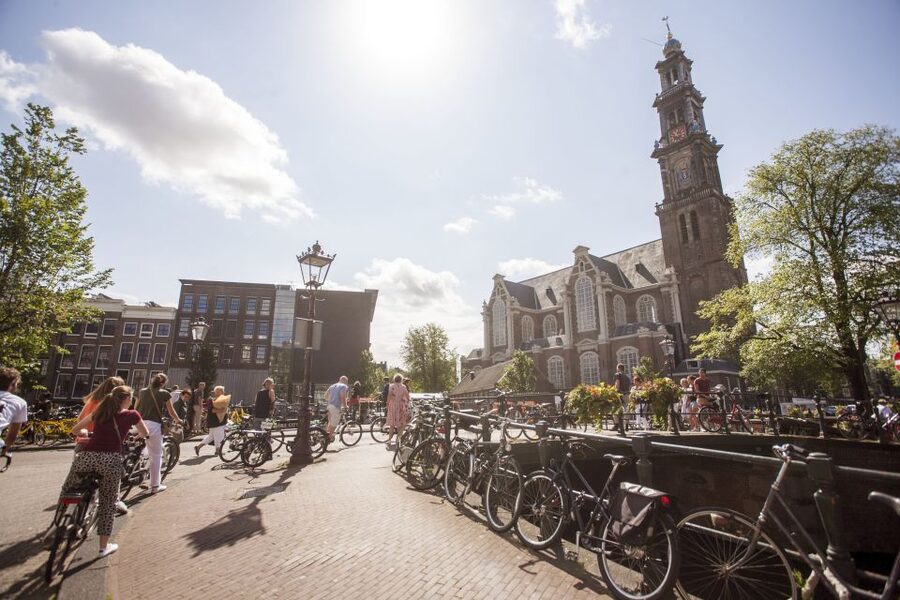 Amsterdam: Hidden Gems & Highlights Guided Bike Tour - Entering Amsterdam by Bike, Not by Checklist
