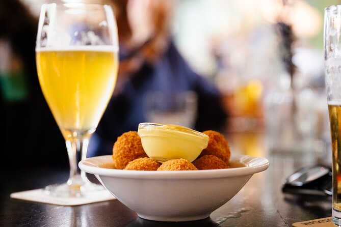 Amsterdam High-End Dutch Food & History Tour - Up to 8 guests - Sunday and Monday: Grillworst Sandwich, Holtkamp Croquette, Spekkoek Cake
