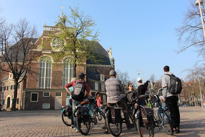 Amsterdam Highlights Bike or E-Bike Tour - Skinny Bridge, the Holocaust Namenmonument, and Nieuwmarkt Gate
