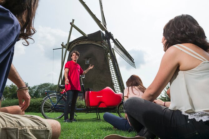 Amsterdam Highlights Bike Tour - Guided in EN/ES/DE/NL - Riding With The Guide: Clear Instructions And A Pace That Makes Sense