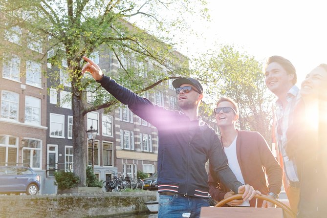 Amsterdam Highlights Canal Cruise with a Drink - Why a Drink + a Private Canal Boat Changes the Feel of Amsterdam