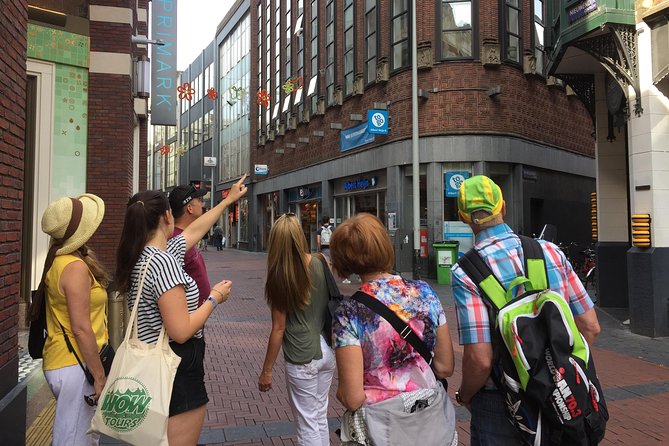 Amsterdam Highlights Walking Tour: Small Group Experience - The Amstel to Golden Age arc: gabled houses and the built-on-water story