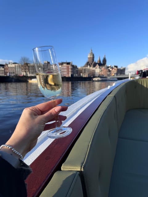 Amsterdam: Historic Boat Cruise with open bar and nibbles - The Sophie (c. 1911) experience: cozy, but not cramped