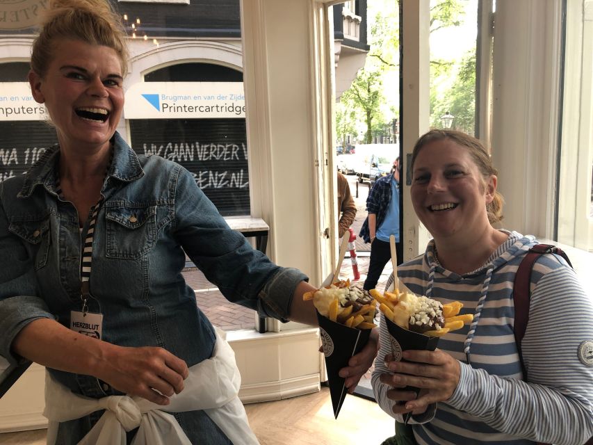 Amsterdam: KULTOUR mit Biss. Kulinarische Stadtführung - Practical expectations: walking, rain gear, and food rules