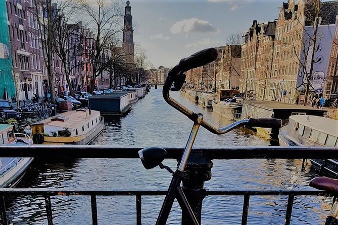 Amsterdam Layover: Airport Transit City Tour - Amstel River time: views, history vibes, and a slower pace