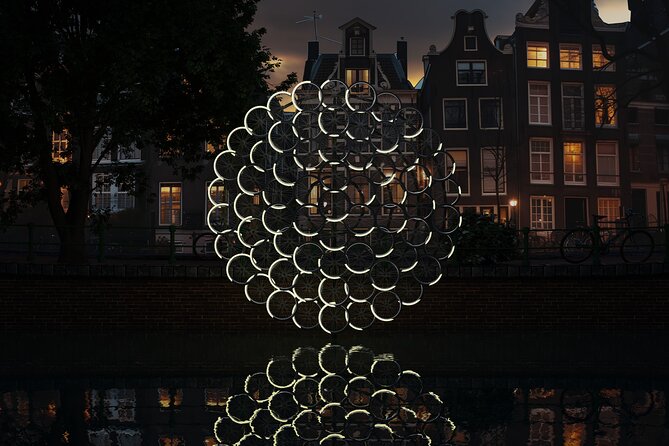 Amsterdam: Light Festival Open Boat - Unl. Drinks Option - NEMO’s Hands On stops: science that feels built for the night