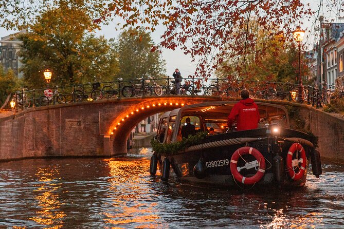 Amsterdam: Light Festival Open Boat - Unl. Drinks Option - A former Navy storage facility and maritime scale you can feel