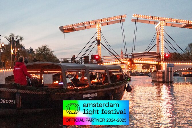 Amsterdam: Light Festival Open Boat - Unl. Drinks Option - The watchtower from 1516, plus the strange clock story