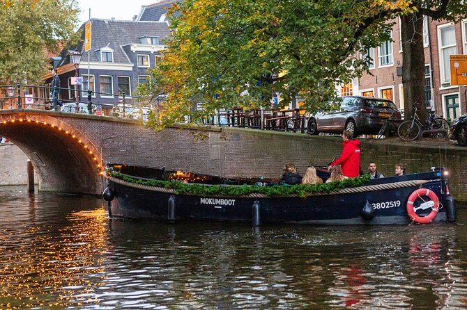 Amsterdam: Light Festival Open Boat - Unl. Drinks Option - The iconic draw bridge tales, and how to play the story game