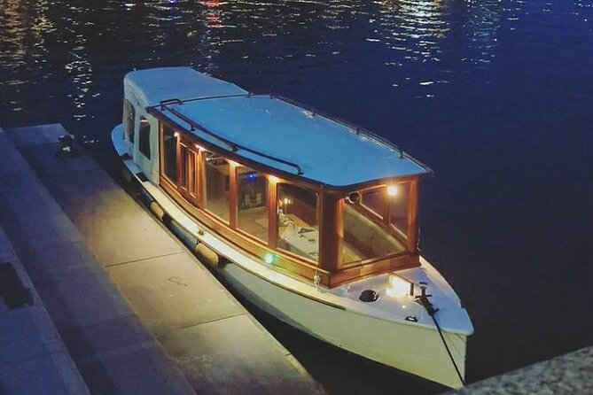 Amsterdam Light Festival Private Cruise With Welcome Drink - Maritime museum area: trading-ship vibes and classic Amsterdam water charm