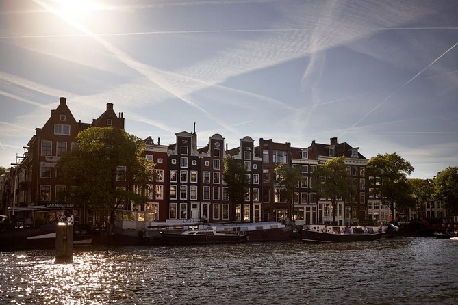 Amsterdam Light Festival: Saloon Boat Cruise + Hot Drinks & Bite - Live Guide Storytelling: Sit Where You Can Hear