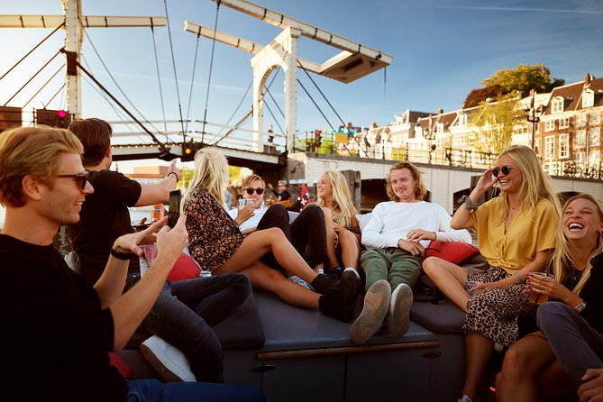 Amsterdam Light Festival: Saloon Boat Cruise + Hot Drinks & Bite - National Maritime Museum Start: Where the Cruise Life Begins