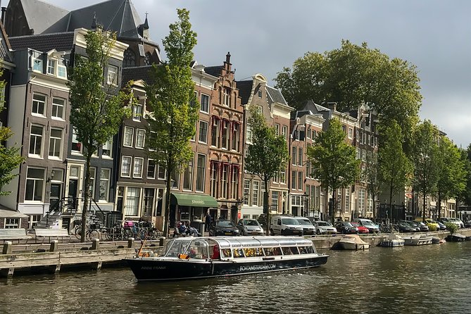 Amsterdam Live Guided Sightseeing Canal Cruise - On-board comfort and drink options for colder days