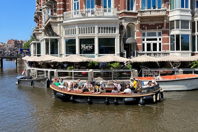 Amsterdam Luxury Boutique Boat tour with Unlimited Beer and Wine - Where you cruise: De Wallen from the canal, not the sidewalk