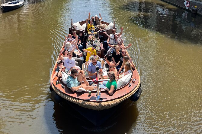 Amsterdam Luxury Boutique Boat tour with Unlimited Beer and Wine - Rembrandt-area passes: art and old Amsterdam in motion