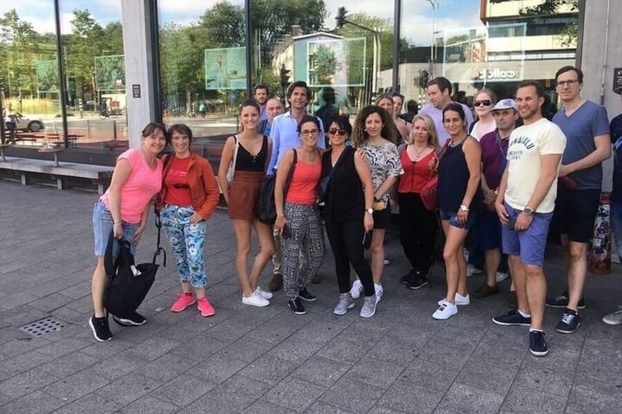 Amsterdam: Must-See Attractions Guided Walking Tour - Maison Descartes Salle André Citroën: A Quick Cultural Detour That Breaks the Pattern
