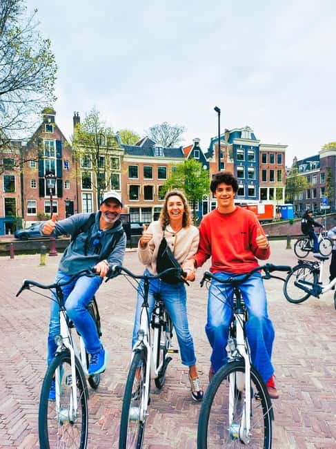 Amsterdam: Off the Beaten Path Bike Tour in French - Entrepotdok and Plantage: a calmer side of central Amsterdam