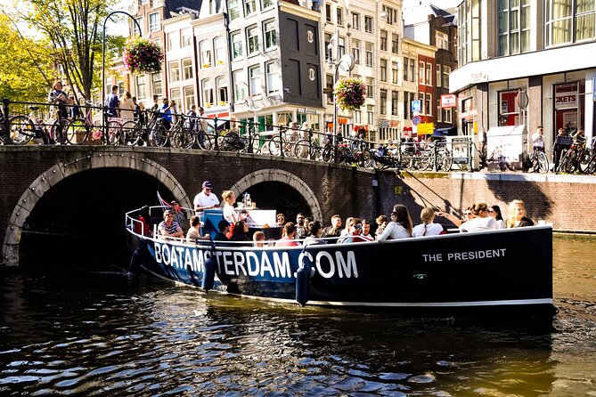 Amsterdam Open Boat Cruise in Old City Centre with Drinks Options - Meeting point at Amstel 51F, and how to arrive ready