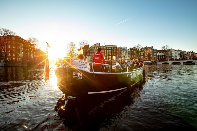Amsterdam Open Boat Cruise with Live Guide and Two Drinks - The two drinks plan, and how the guide keeps it lively