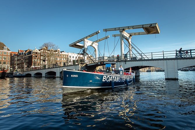 Amsterdam Open Boat Cruise with Live Guide and Two Drinks - Open-air in summer, covered in winter, and heated seats that actually help
