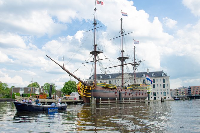 Amsterdam Open Boat Sightseeing Canal Cruise - Rijksmuseum and Amsterdam Centraal, seen in a different frame