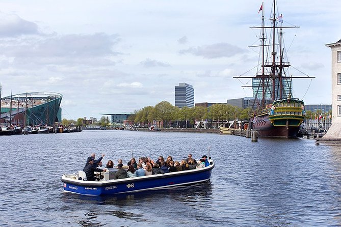Amsterdam Open Boat Sightseeing Canal Cruise - When rain hits, you still get your canal time