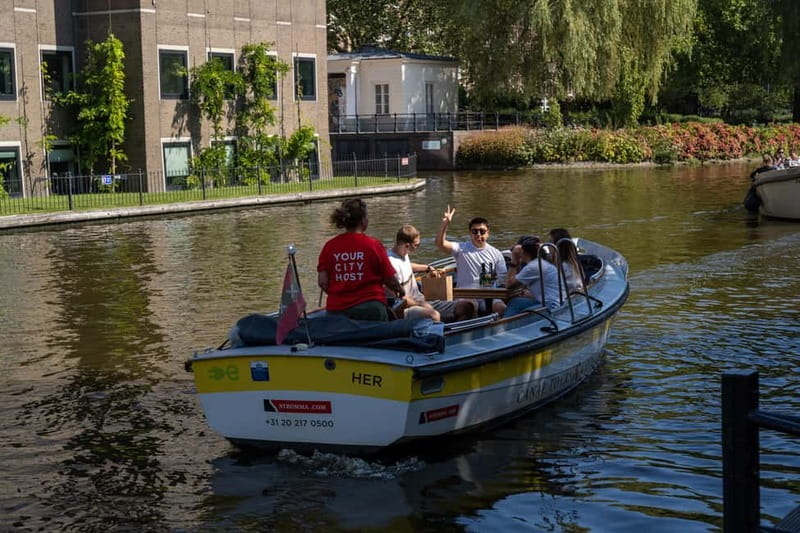 Amsterdam: Open Boat Tour of Canals with Expert Local Guide - Price and Value: What $26 Gets You in Amsterdam