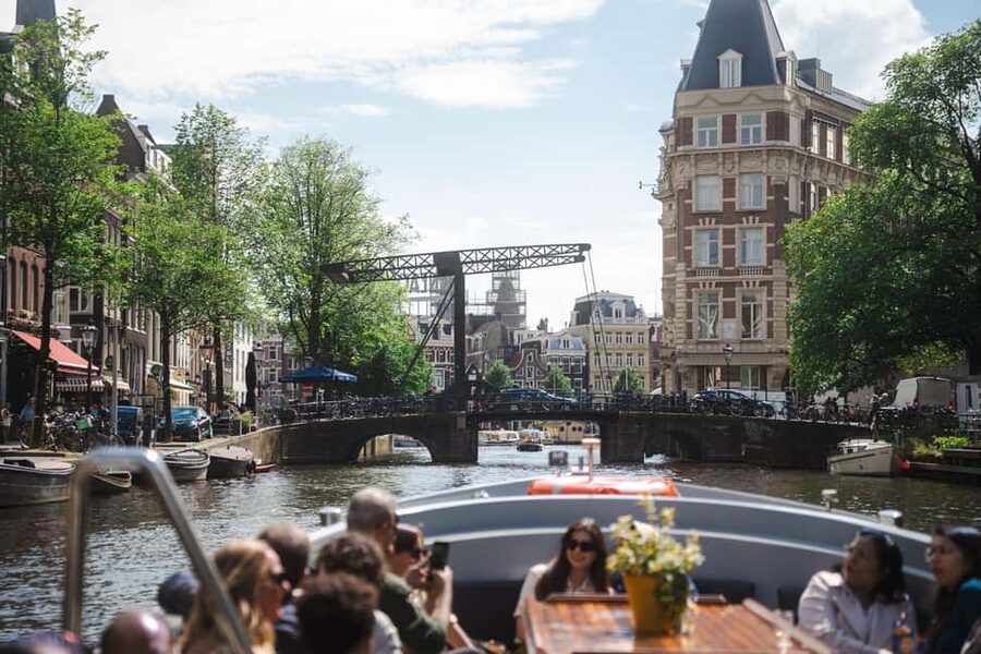 Amsterdam: Open Boat Tour of Canals with Expert Local Guide - Tips That Make the Experience Smoother
