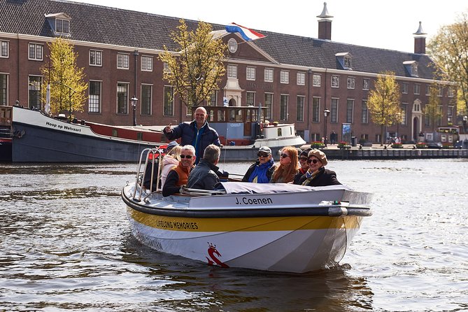 Amsterdam Open Boat Tour with Local Guide - Why the open-boat canal ride beats the walking tour