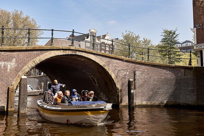 Amsterdam Open Boat Tour with Local Guide - Passing under the Bridge of Love (and watching it from the water)