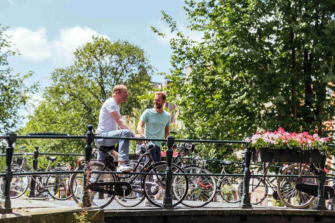 Amsterdam PRIVATE Bike Tour With Locals: Bike & Local Snack Included - Westerkerk stop: a big Amsterdam church without the pressure to tour