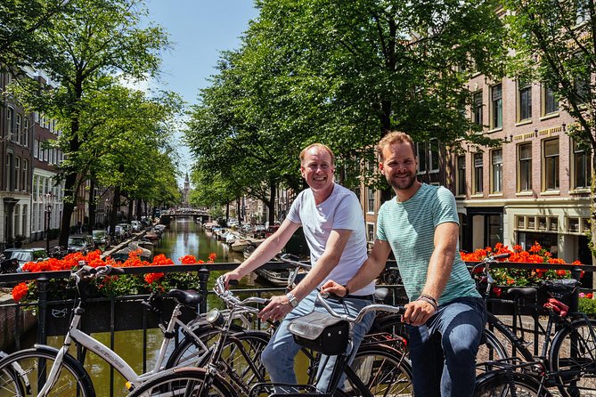 Amsterdam PRIVATE Bike Tour With Locals: Bike & Local Snack Included - Can this tour go beyond the center? Yes, depending on your guide